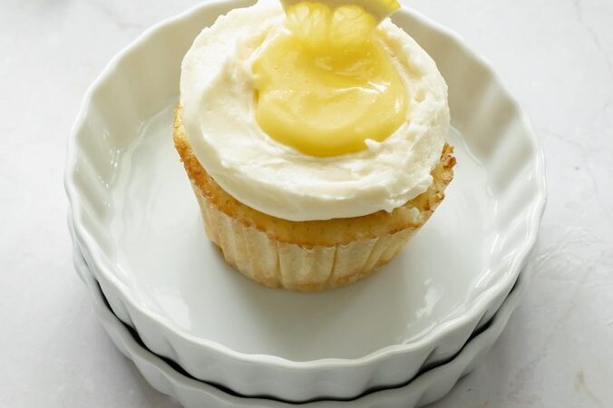 Lemon Curd Filled Vanilla Cupcakes with Swiss Meringue Buttercream