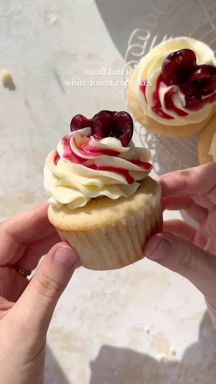 Vanilla Cupcakes with Cherry Jam and White Chocolate Buttercream