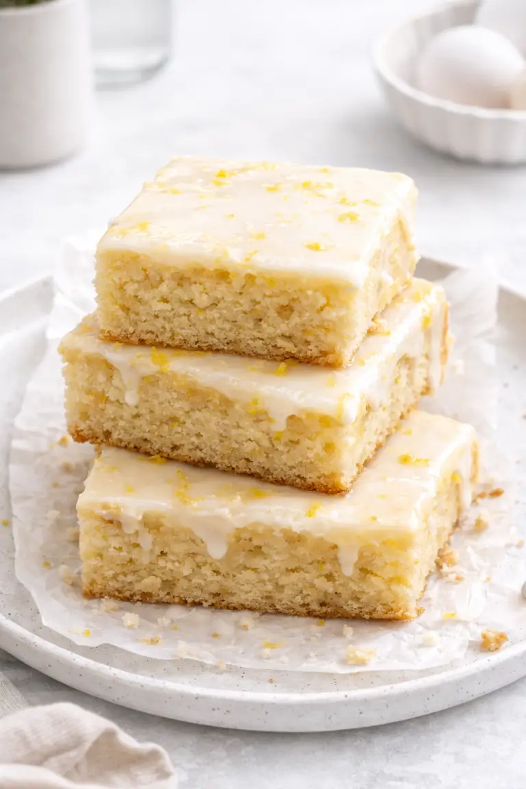 Soft and Chewy Lemon Blondies with a Zesty Glaze